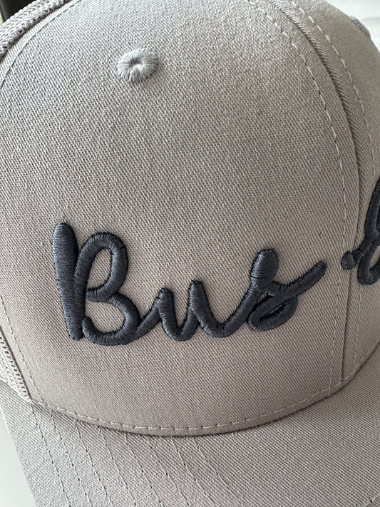 Snap Back Trucker Cap. Grey & grey. Dark grey 3D logo