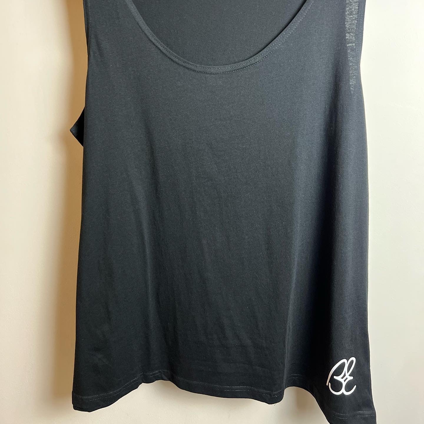 Ladies vest. Black with white print