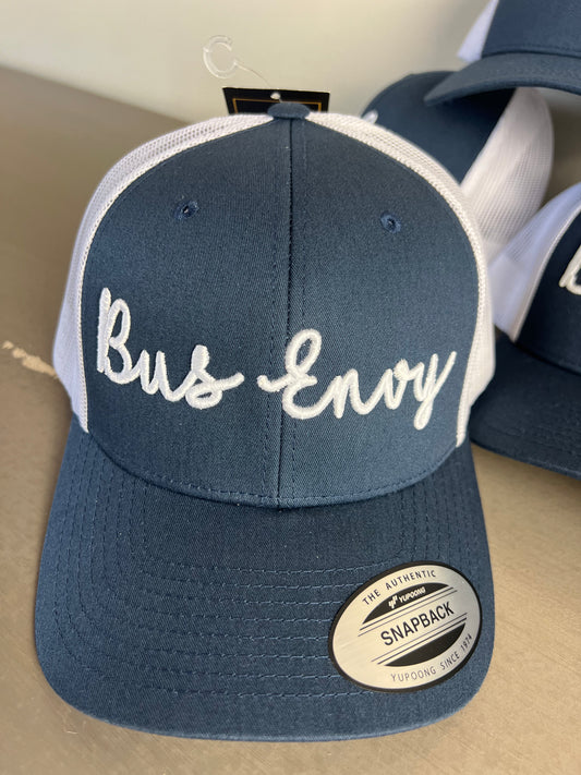 Snap Back Trucker Cap. Navy & white. White 3D logo