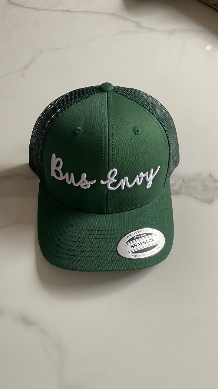 Snap Back Trucker Cap. Green. White 3D logo