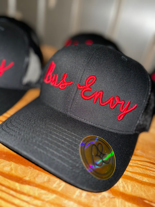 Snap Back Trucker Cap. All Black. Red 3D logo