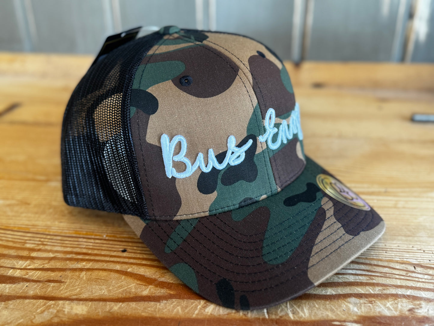Snap Back Trucker Cap. Cammo & Black. White 3D logo