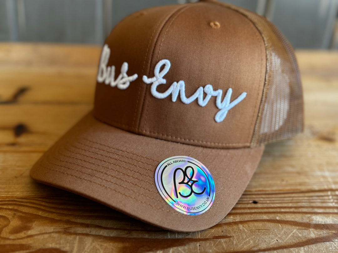 Snap Back Trucker Cap. Camel & white 3D logo