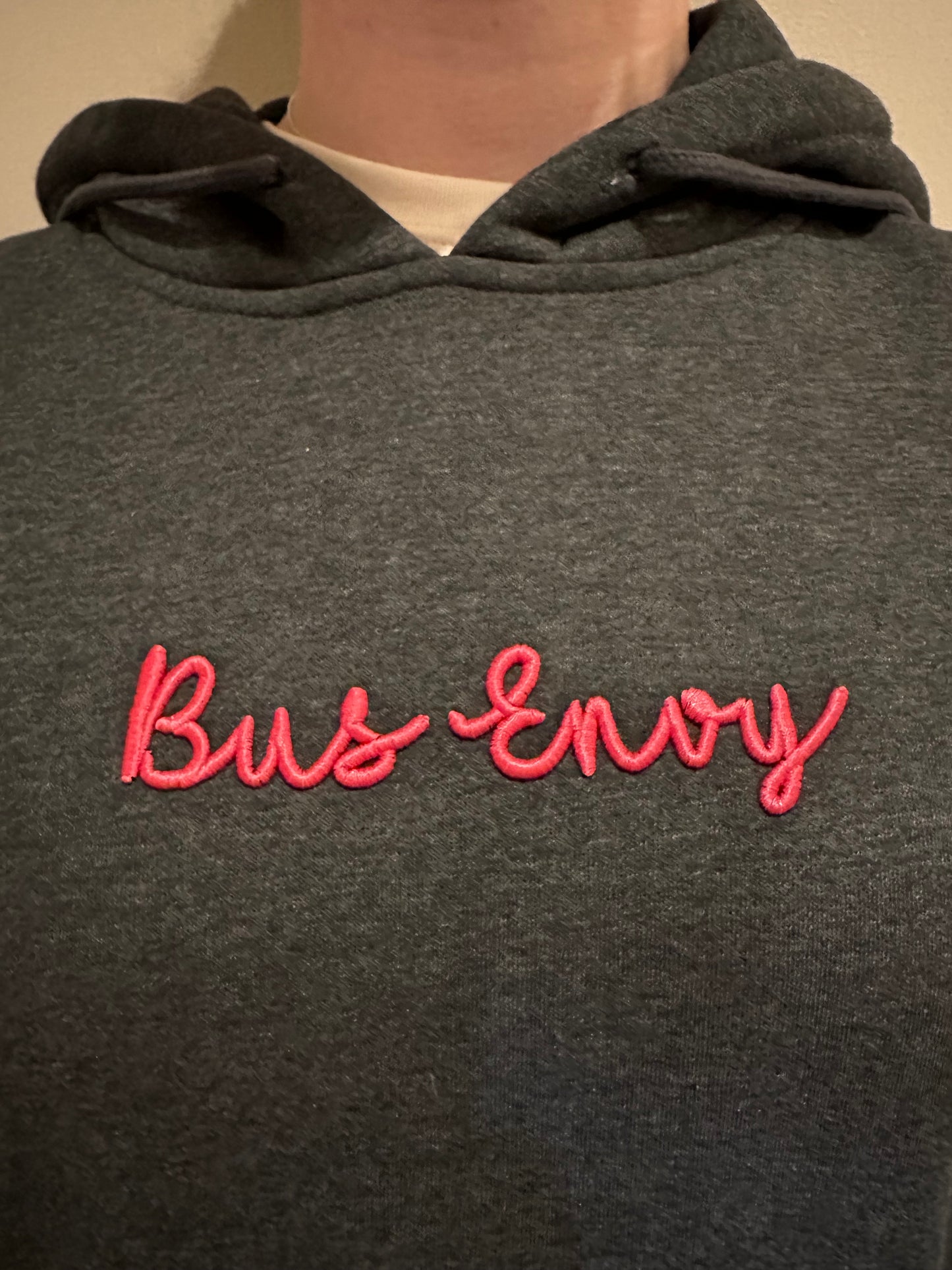 Signature embroidered hoodie. 3D Bus Envy logo. Charcoal grey & neon pink