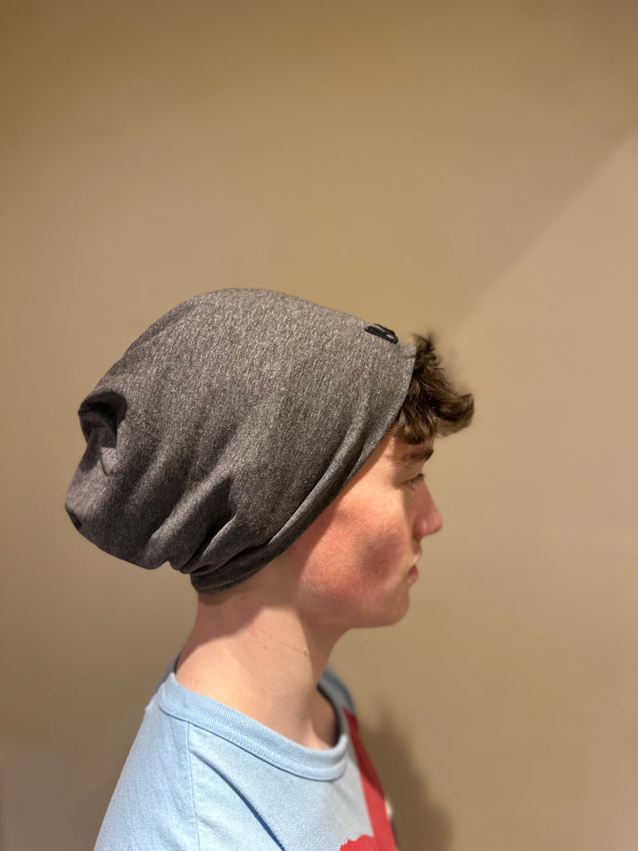 Unisex slouchy Bus Envy beanie. Charcoal grey & black