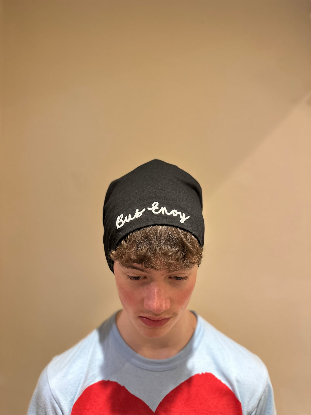 Unisex slouchy Bus Envy beanie. Black & white