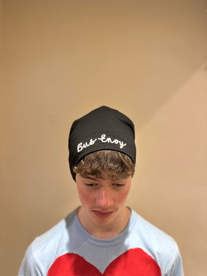 Unisex slouchy Bus Envy beanie. Black & white