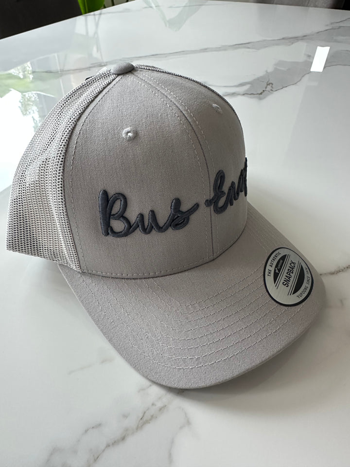 Snap Back Trucker Cap. Grey & grey. Dark grey 3D logo