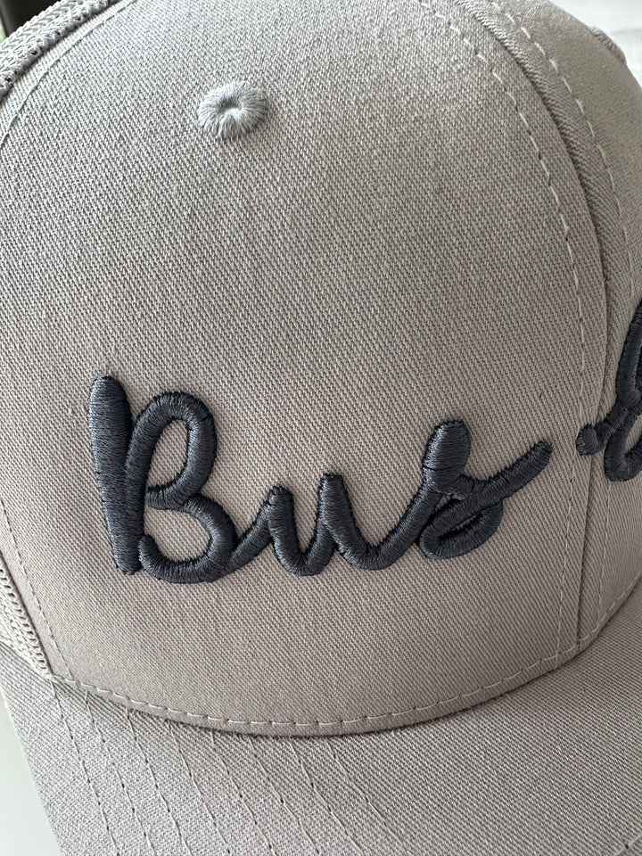 Snap Back Trucker Cap. Grey & grey. Dark grey 3D logo