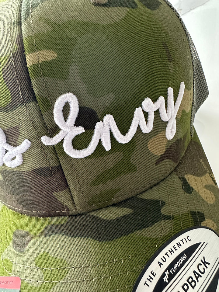 Snap Back Trucker Cap. Cammo & Green. White 3D logo