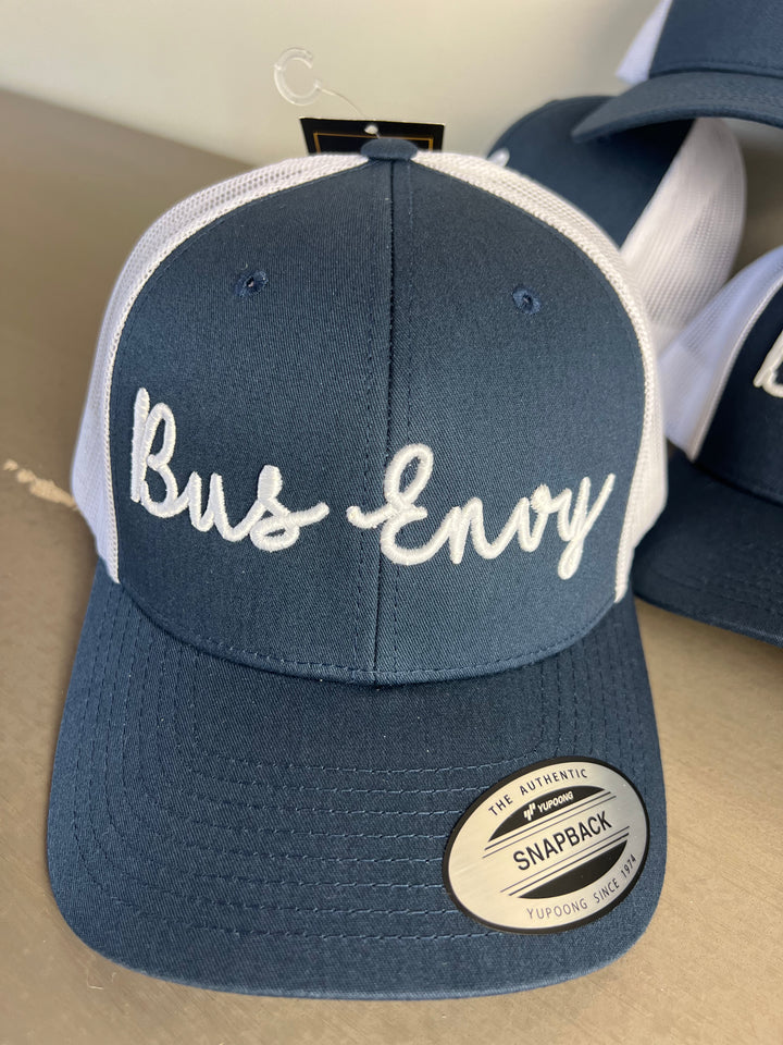 Snap Back Trucker Cap. Navy & white. White 3D logo