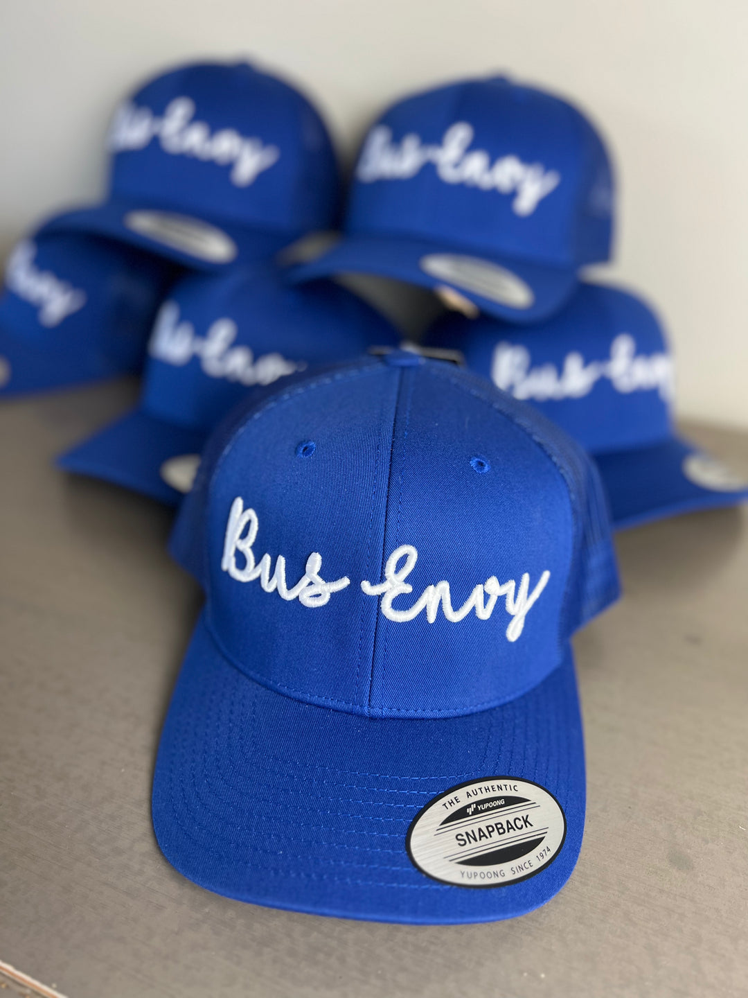 Snap Back Trucker Cap. Royal blue & white. 3D logo