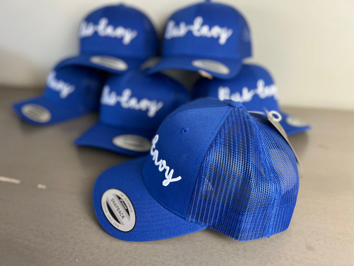 Snap Back Trucker Cap. Royal blue & white. 3D logo