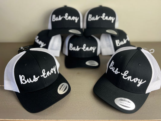 Snap Back Trucker Cap. Black & White. White 3D logo