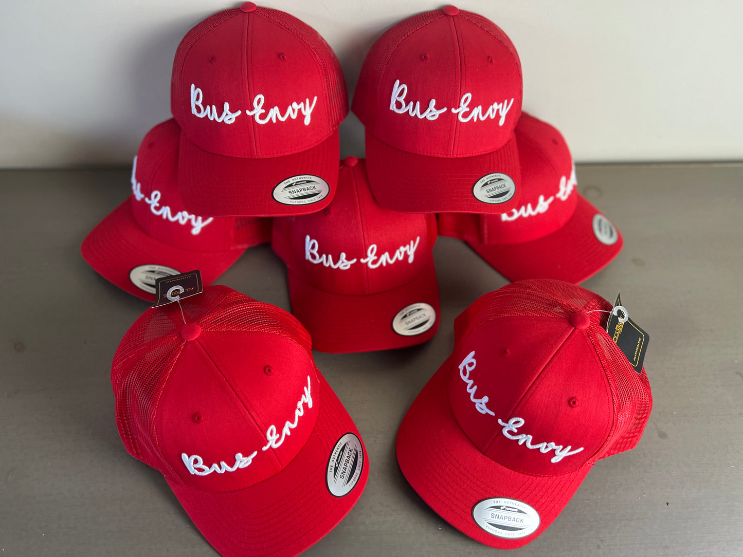 Snap Back Trucker Cap. Red & White. 3D logo