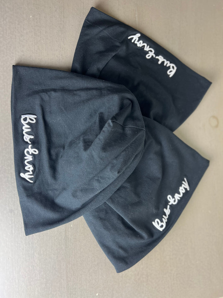 Unisex slouchy Bus Envy beanie. Black & white