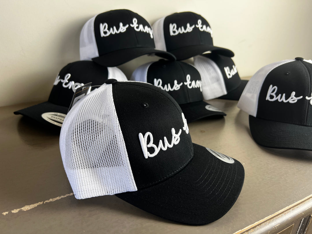 Snap Back Trucker Cap. Black & White. White 3D logo